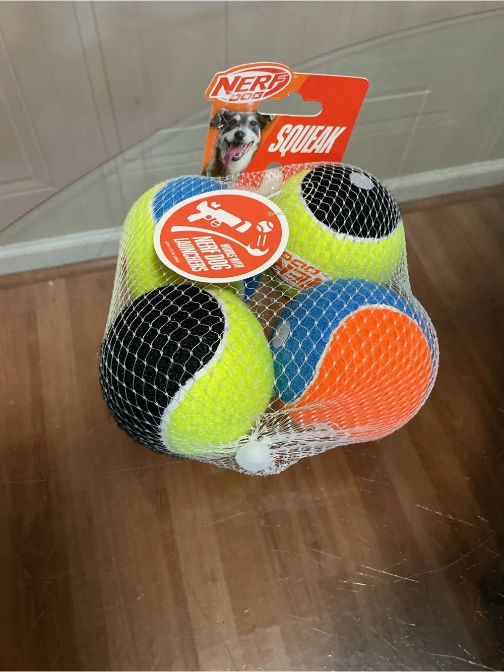 Durable Nerf Dog Squeak Tennis Balls 4 Pack Dog Toy Assorted Colors Interactive